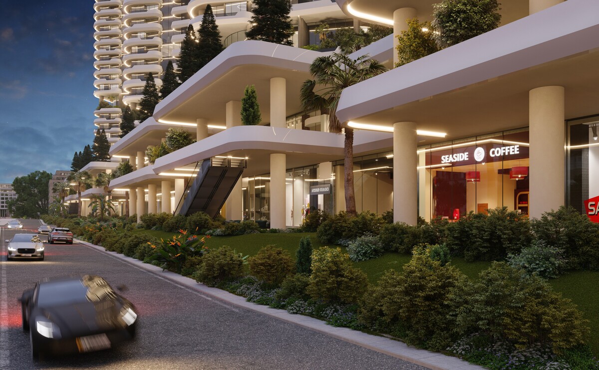 Street-level view of Tulip Towers featuring landscaped walkways, retail spaces, cafés, and elegant architectural details. The image highlights the development’s vibrant mixed-use environment and welcoming public realm.