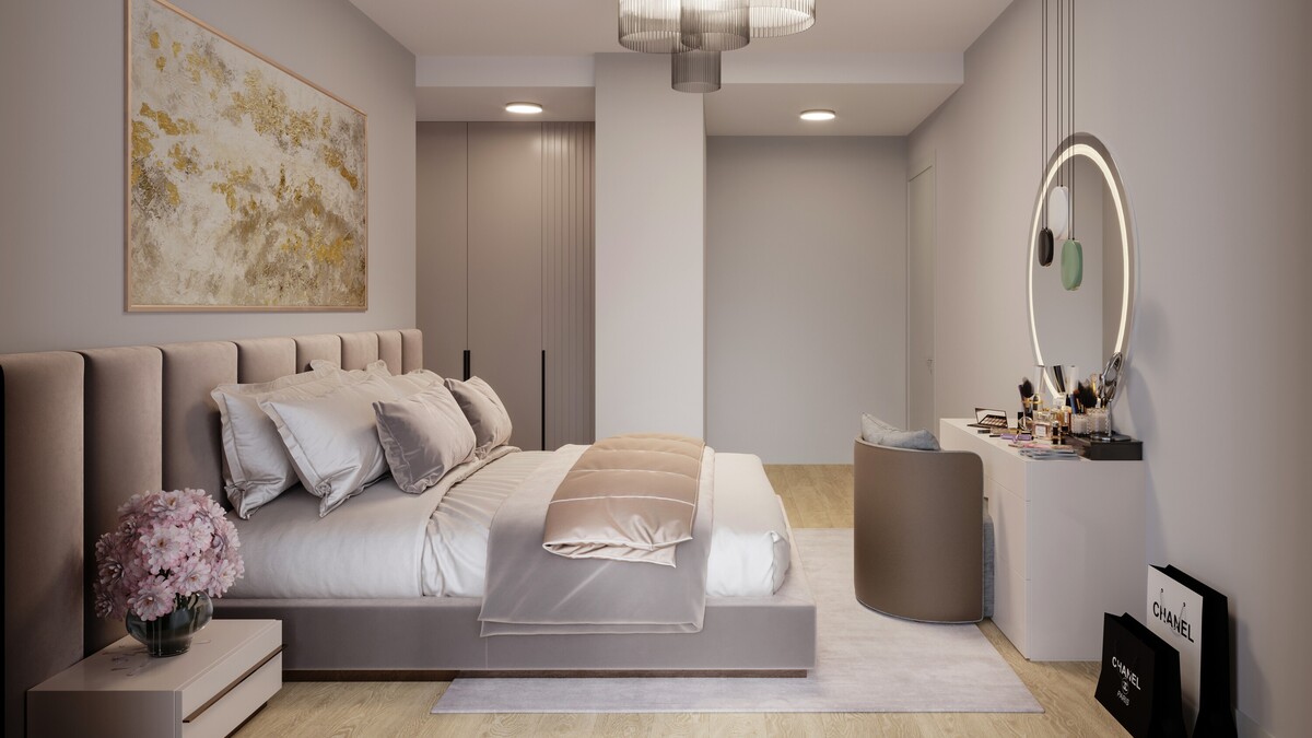Contemporary bedroom at Tulip Towers featuring a soft neutral color palette, custom furnishings, and a dedicated vanity area. The image showcases elegant interior design, premium finishes, and a calm residential atmosphere.